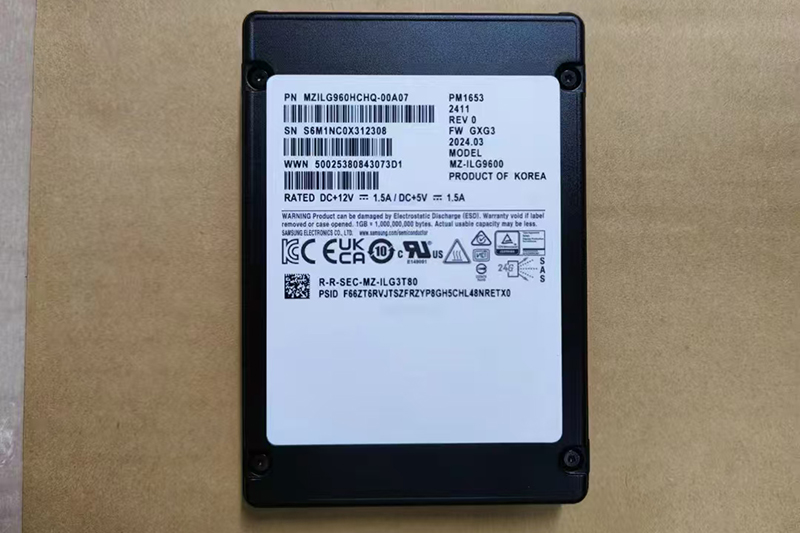 an ssd on a table displaying a barcode, with an hdd visible nearby for comparison