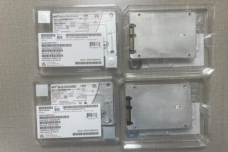 four ssd hard drives in plastic cases arranged on a table, showcasing their compact design and storage capabilities